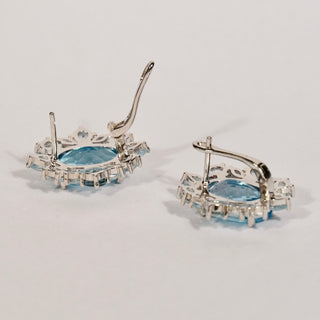 Earrings in 925 silver with blue topazes